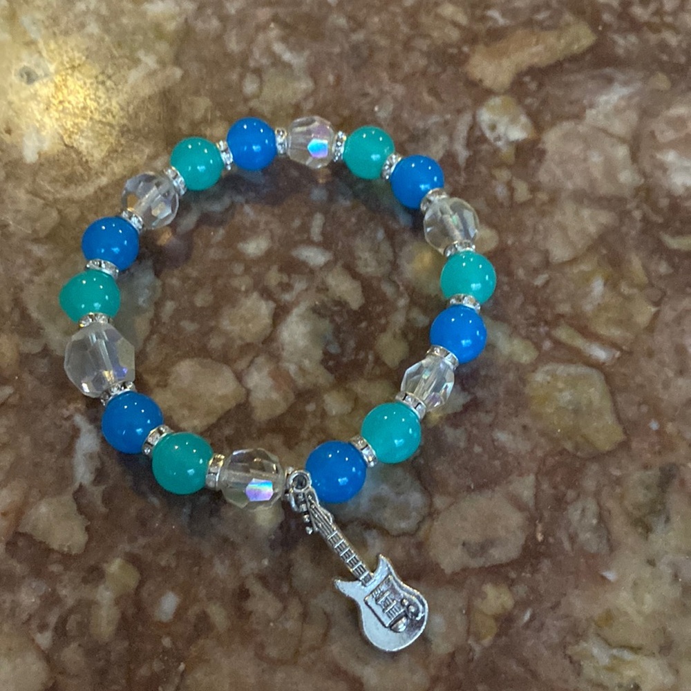 Handmade stretch rock n roll theme bracelet